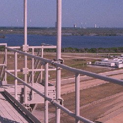 Aaron, his Dad, and Carlos on the catwalks of the Launch Tower.