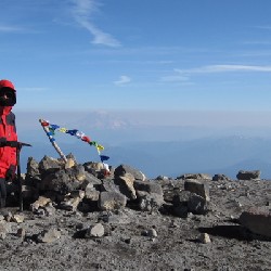 Aaron on Mount Adams Summit w/ Rainier Background