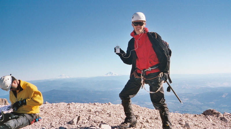 Aaron with his iPod on the summit of Mt. Hood